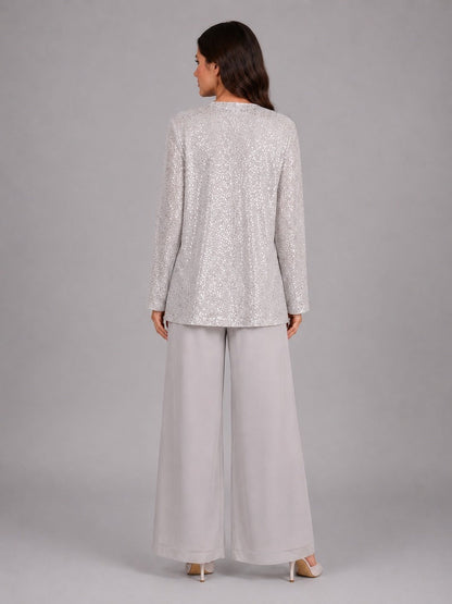 Zelinda | Completo a tre pezzi con giacca aperta in paillettes, top e pantaloni a gamba larga